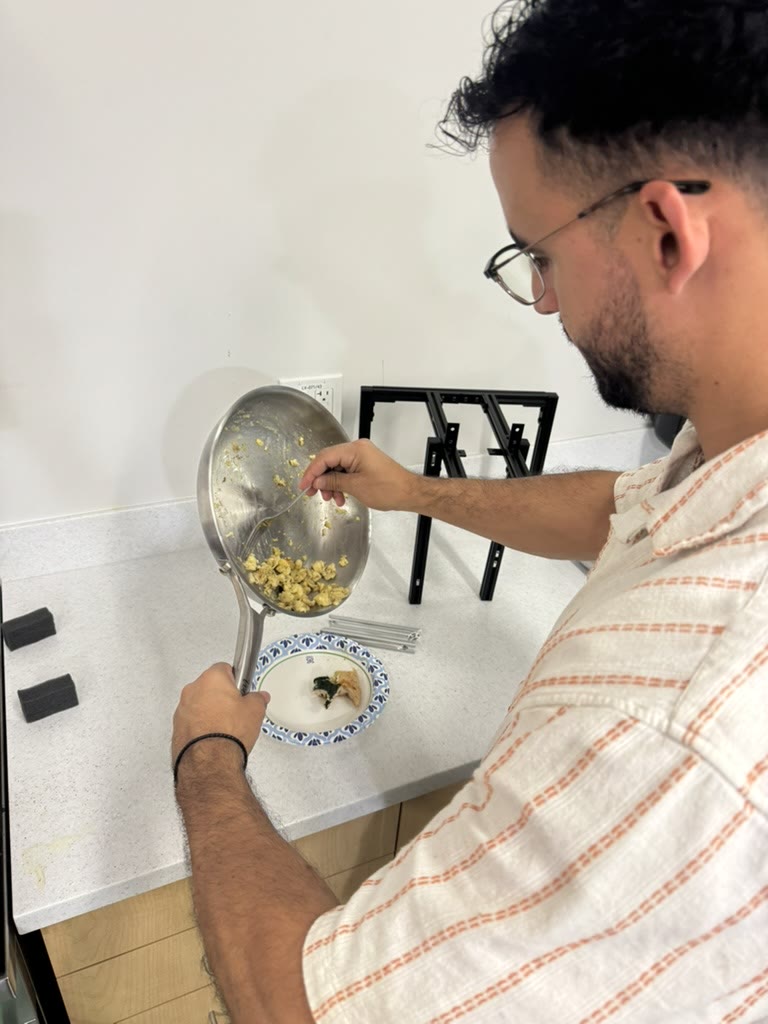 Adrian greedily taking the rest of the eggs